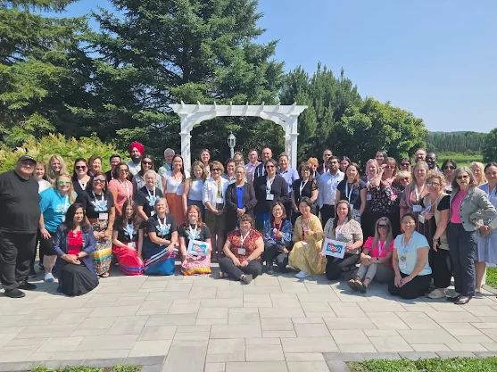 large group shot at Indigenous symposium 2025